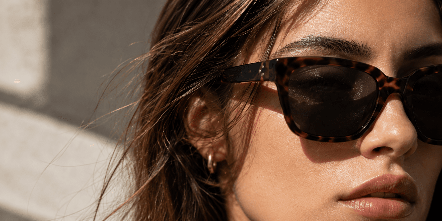 Tortoiseshell sunglasses in close-up.
